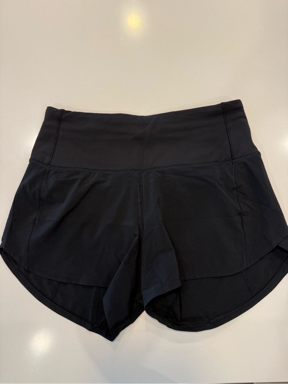 Lululemon speed up shorts, size 4, new without tags, never worn. 4 inch inseam